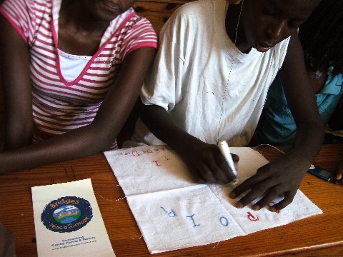 Students working on quilt